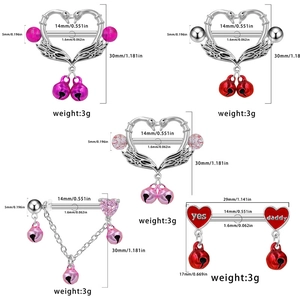 Surgical steel nipple rings with festive bells and heart wing dangle designs