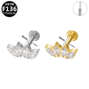 Détail de piercing en titane ASTM F136 avec zircons marquise et connexion sans filetage
