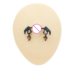 Black skeleton hands nipple ring with red heart crystal pendants on silicone model