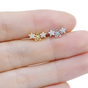 Elegant stainless steel flower labret studs with cubic zirconia in gold and silver finish