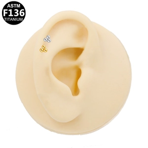 Piercing labret a tre sfere in titanio G23 oro e argento per lobi e cartilagine
