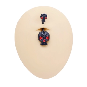 Detail of punk navel ring featuring black skull charms with red eyes on silicone model