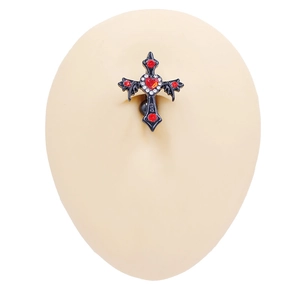 Gothic black cross belly button ring with red heart zircon displayed on a silicone mold