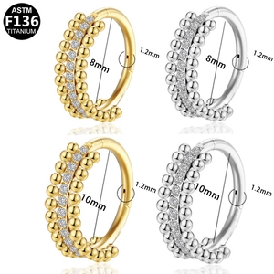 G23 titanium hinged segment ring with paved zircons and bead accents in gold and silver