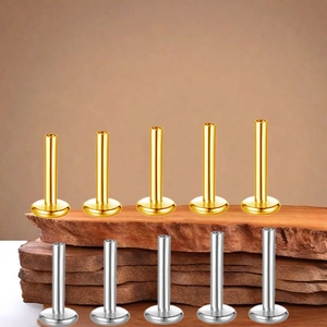 Polished G23 titanium flat back studs in gold and silver for ear and lip piercings