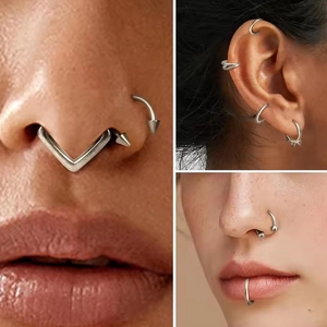 Titanium horseshoe septum rings and nose studs set shown on a model for body piercing