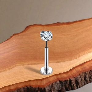 Piercing labret de titanio con base plana y circonita redonda de corte brillante