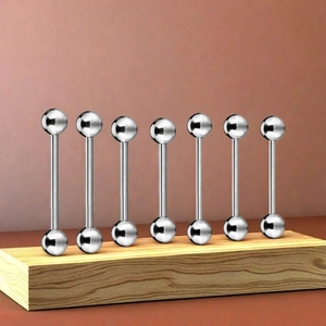 Set of seven silver titanium industrial barbell earrings with polished mirror finish