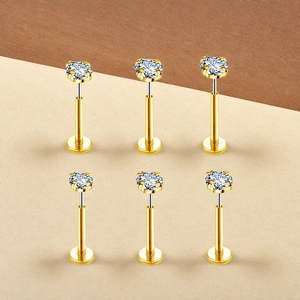 Set de seis piercings labret de titanio G23 dorado con piedras de circonita clara redonda
