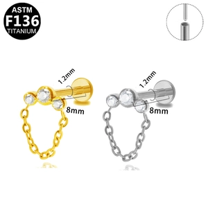 ASTM F136 titanium flame labret stud set with chain and zircon in gold and silver finish