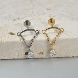 G23 titanium labret studs with marquise zircon chains in silver and gold finishes