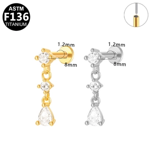 Detailed view of G23 titanium labret studs with marquise zircon chain and internal threading