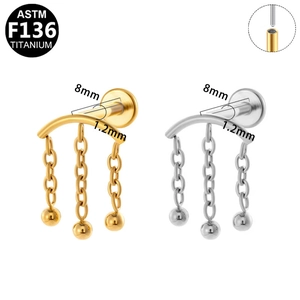 Detail of ASTM F136 titanium piercing stud with triple chains and small ball pendants