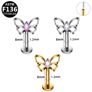 Detail van de ASTM F136 titanium vlinder labret met marquise steen en draadloze structuur