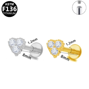 Close-up of G23 titanium heart labret stud with internal thread and zircon details