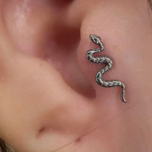 G23 titanium snake stud earring for cartilage piercing with detailed scale engraving