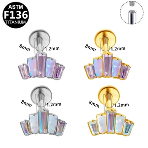 Detailed macro view of fan-shaped opal and crystal settings on titanium labret stud