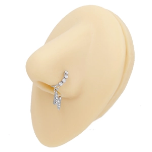 Detail shot of silver lightning pendant nose ring with sparkling rhinestones on model
