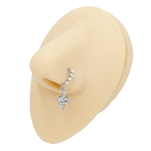 Detailed view of silver hoop nose ring with sparkling paved zircon snake pendant