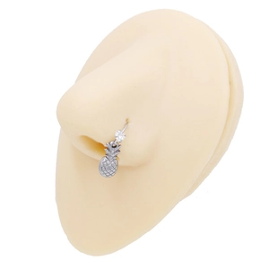 Detailed view of silver steel nose ring featuring a pineapple charm and white zircon stone