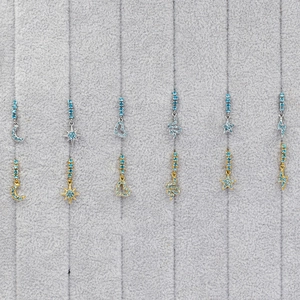 316 stainless steel nose rings with light blue zircons in moon and star shapes