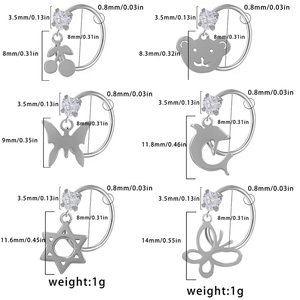 Surgical stainless steel nose rings with charms like bear, butterfly, and cherry designs