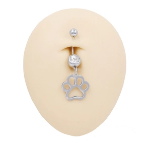 Detailed view of stainless steel belly ring featuring a zircon and animal paw pendant