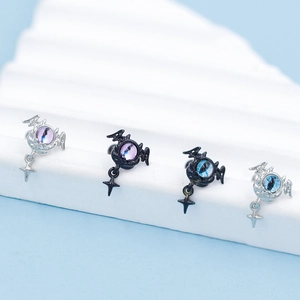 Gothic bat wing ear studs with colorful eyeball stones and small star pendants