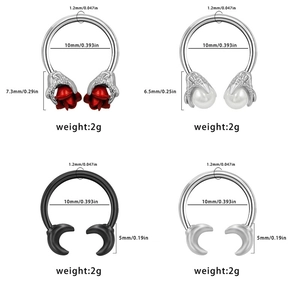 Horseshoe septum rings set featuring gothic rose, pearl, and crescent moon designs