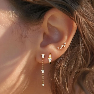 Gold titanium tassel ear studs and cuff set featuring teardrop-shaped zircon stones