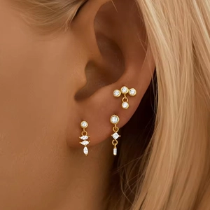 Juego de 3 pendientes piercing F136 dorados con estrellas de circonita blanca brillante