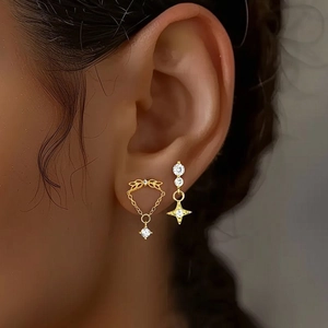Elegant gold bow and star stud earrings set with zircon stones for a luxury look