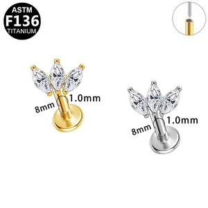 Vue détaillée des piercings labret en titane ASTM F136 avec zircons marquise en éventail