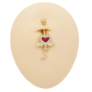 Detailed view of a gold devil heart belly ring with red gem and rhinestone wings