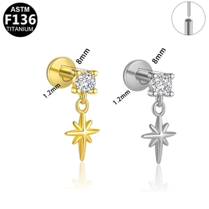 Detalle de piercing de titanio ASTM F136 con estrella, rosca 1.2mm y circonita