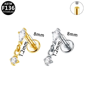 Detailed view of F136 titanium labret with internal threads and zircon teardrop pendant