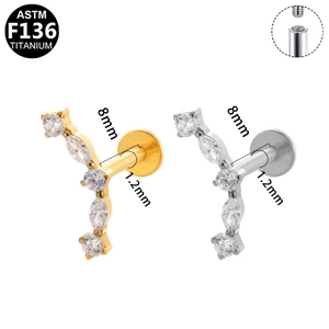 Dettaglio del piercing labret in titanio G23 con zirconi marquise e misure tecniche
