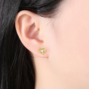 G23 titanium heart-shaped stud earrings with gold plating and clear zircon inlay