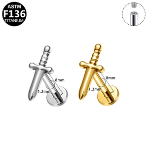 Detail of F136 titanium dagger piercing studs with 8mm length and 1.2mm gauge