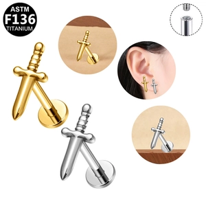 Detailed view of ASTM F136 titanium sword labret studs with internal threading feature