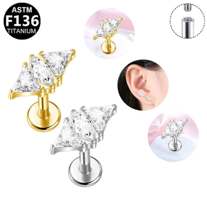 F136 titanium labret stud with fan-shaped triple zircon crystals in gold and silver