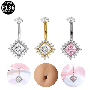 ASTM F136 titanium belly button rings with cubic zirconia charms in silver and gold finish