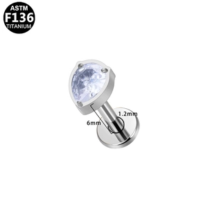 Detail of ASTM F136 titanium labret with heart-shaped zircon and 6mm screw post