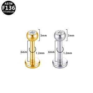 Technical view of F136 titanium labret stud showing 1.2x6x3mm dimensions and CZ top