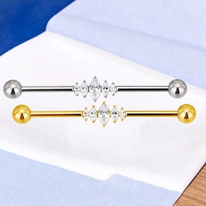 Macro-opname van F136 industriële barbell met marquise-zirkonia in goud en zilver