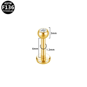 Detail of ASTM F136 titanium stud featuring a 3mm white zircon and flat back design