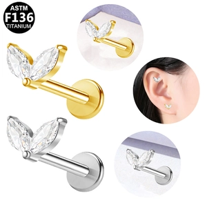 Detail of leaf-shaped F136 titanium stud with marquise zirconia and flat back