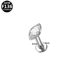 Macro view of ASTM F136 titanium earring with marquise-cut zircon and 6mm screw post