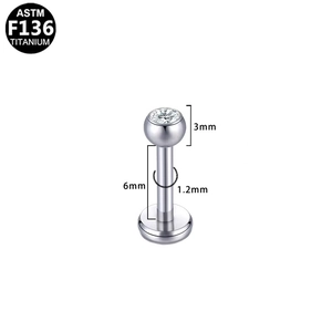 Detail of 3mm white zircon stud in polished F136 titanium with 1.2x6mm dimensions