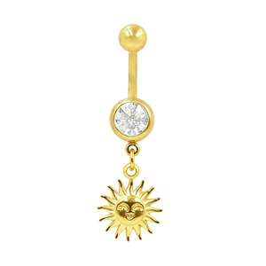 Vue détaillée du piercing de nombril avec pendentif soleil doré et zircon blanc